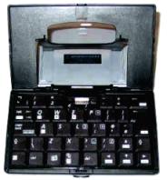 HP-Compaq iPAQ foldable keyboard partially opened